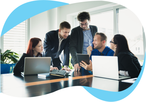 Five colleagues having group discussion regarding some topics with the laptops and the diaries in their hands and table.